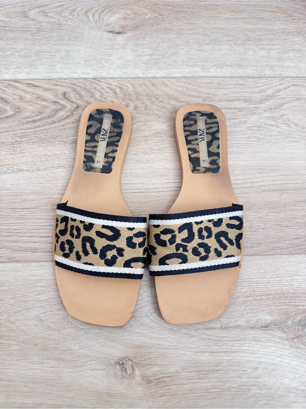 Zara Leopard Print Slide Sandals in Tan and Black with White Trim